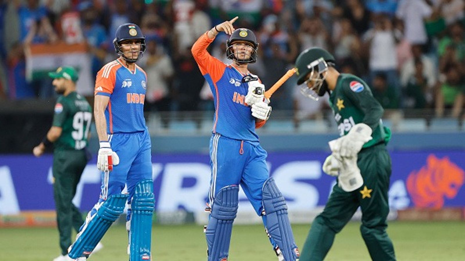 WATCH: Abhishek Sharma decodes secret behind 'L' celebration after India's dominating six-wicket win against Pakistan in Asia Cup 2025 Super Four tie : Abhishek Sharma of India (C) celebrates fifty runs with Shubman Gill of India during the match between India and Pakistan at Dubai International Stadium on September 21, 2025 in Dubai, United Arab Emirates.