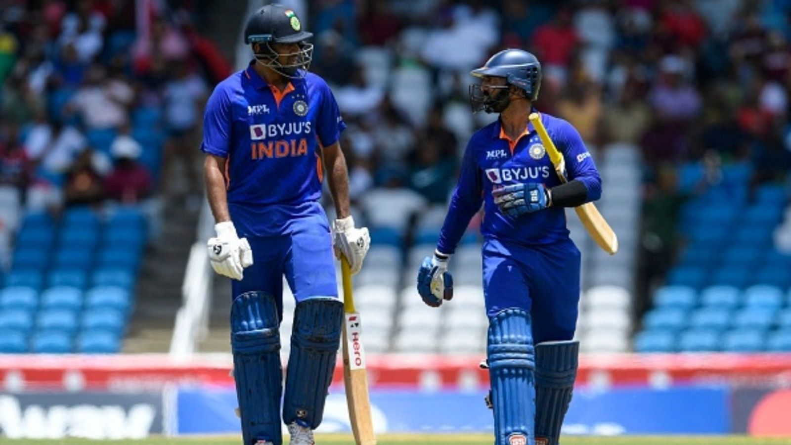 After R Ashwin, Dinesh Karthik to play Hong Kong Sixes, named captain of Team India Ravichandran Ashwin (L) and Dinesh Karthik (R) of India walk off the field not out during the 1st T20I against West Indies at Brian Lara Cricket Academy in Tarouba, Trinidad and Tobago on July 29, 2022.