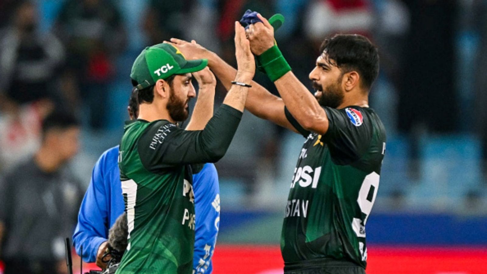 'I give players license to react the way they want': Salman Agha defends Pakistan pacers Shaheen Afridi, Haris Rauf's actions vs India Pakistan's captain Salman Agha (L) and his teammate Pakistan's Haris Rauf celebrate after defeating Bangladesh in the Asia Cup 2025 Super Four clash at the Dubai International Stadium in Dubai on September 25, 2025.