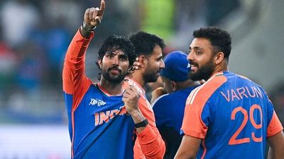 IND vs PAK: Tilak Varma-Kuldeep Yadav's magic guides India to record-extending 9th Asia Cup title after trumping Pakistan by 5 wickets in last-over thriller Tilak Varma (L) celebrates after winning the Asia Cup 2025 title for India
