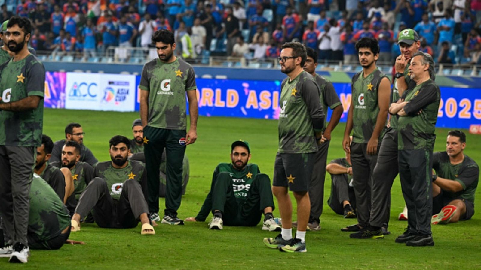 PCB punishes its players after T20 Asia Cup 2025 final defeat, suspends NOCs for all overseas T20 leagues outside Pakistan: Report Pakistan's cricket team members wait for the presentation ceremony at the end of the Asia Cup 2025 final match defeat against India at the Dubai International Stadium in Dubai on September 28, 2025.