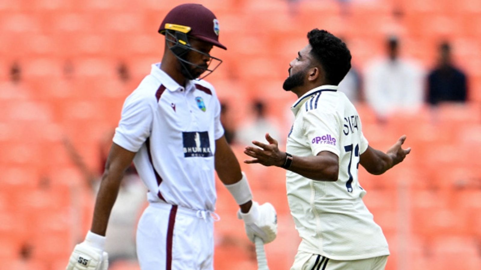 IND vs WI: Siraj, Bumrah wreak havoc in overcast Ahmedabad conditions, West Indies collapse for 162 within 2 sessions in opening Test India's Mohammed Siraj (R) celebrates after taking the wicket of West Indies' captain Roston Chase (L) during the first day of the first Test at the Narendra Modi Stadium in Ahmedabad on October 2, 2025.
