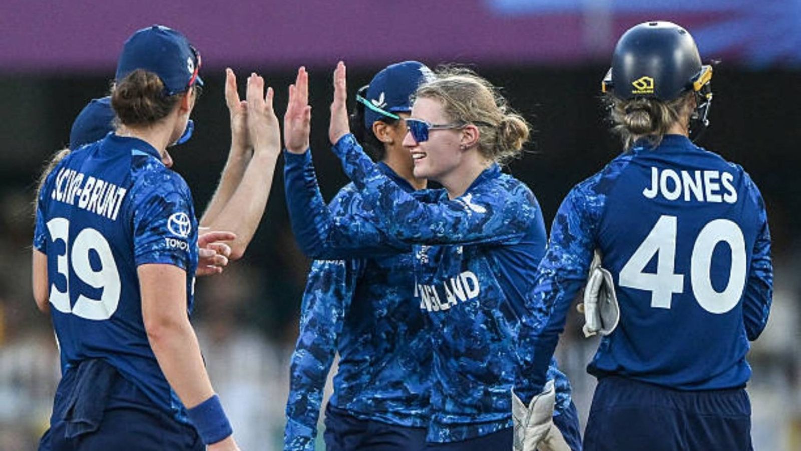 Women's World Cup 2025: Linsy Smith and Amy Jones shine as England demolish South Africa by 10 wickets in one-sided clash England's Charlie Dean (2R) celebrates with teammates after taking the wicket of South Africa's Masabata Klaas during the ICC Women's Cricket World Cup 2025 one-day international (ODI) match between England and South Africa
