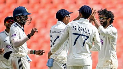 IND vs WI, 1st Test: Ravindra Jadeja stars with century and four wickets as India beat West Indies by an innings and 140 runs in series opener India's Ravindra Jadeja (R) and Yashasvi Jaiswal (C) celebrate with captain Shubman Gill (2R) after taking the wicket of West Indies' Shai Hope during the third day of the first Test cricket match between India and West Indies