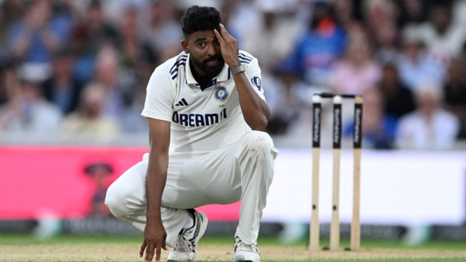 'Jaake apne baap ke saath auto chalao': Mohammed Siraj opens up on cruel trolling, recalls MS Dhoni's valuable advice when he joined Team India Mohammed Siraj of India looks dejected during day four of the fifth Test against England at The Oval on August 03, 2025 in London, England.