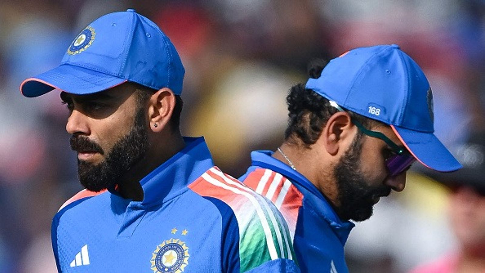 'Selectors may have checked that...': Cricketing legend questions Rohit Sharma, Virat Kohli's selection in India's ODI squad against Australia Rohit Sharma (R) and his teammate Virat Kohli walk past each other during the second one-day international (ODI) cricket match between India and England at the Barabati Stadium in Cuttack