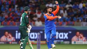 Varun Chakravarthy of India bowls during the Asia Cup match between India and Pakistan at Dubai International Stadium on September 14, 2025 in Dubai, United Arab Emirates. Varun Chakravarthy of India bowls during the Asia Cup match between India and Pakistan at Dubai International Stadium on September 14, 2025 in Dubai, United Arab Emirates.