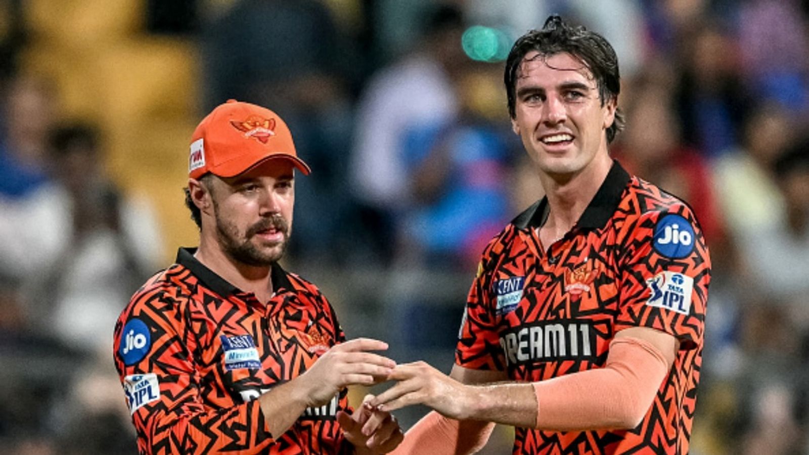Pat Cummins, Travis Head offered Rs 58 crore per year each by IPL team to quit international cricket and play T20s in different leagues: Report Sunrisers Hyderabad's captain Pat Cummins (R) celebrates with teammate Travis Head after taking the wicket of Mumbai Indians' Rohit Sharma during the Indian Premier League (IPL) match at the Wankhede Stadium in Mumbai on April 17, 2025.