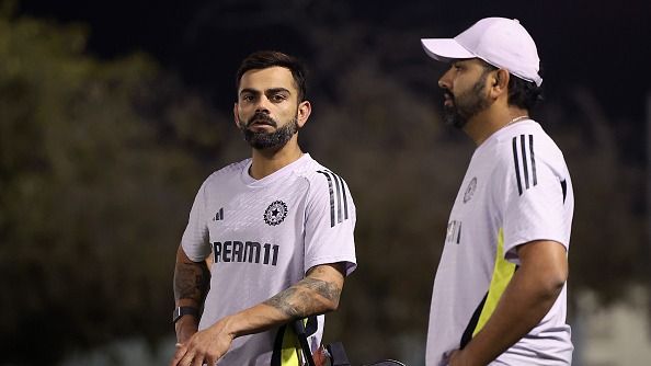 Virat Kohli of India speaks to Rohit Sharma during a India Nets Session at ICC Academy on March 07, 2025 in Dubai, United Arab Emirates.
