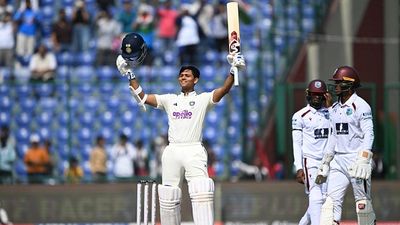 IND vs WI: India ride on Jaiswal's unbeaten 173, Sudharsan's solid 87 to dominate West Indies with robust 318/2 on Day 1 of second Test India's Yashasvi Jaiswal (L) celebrates after scoring a century on Day 1 of the 2nd Test against West Indies