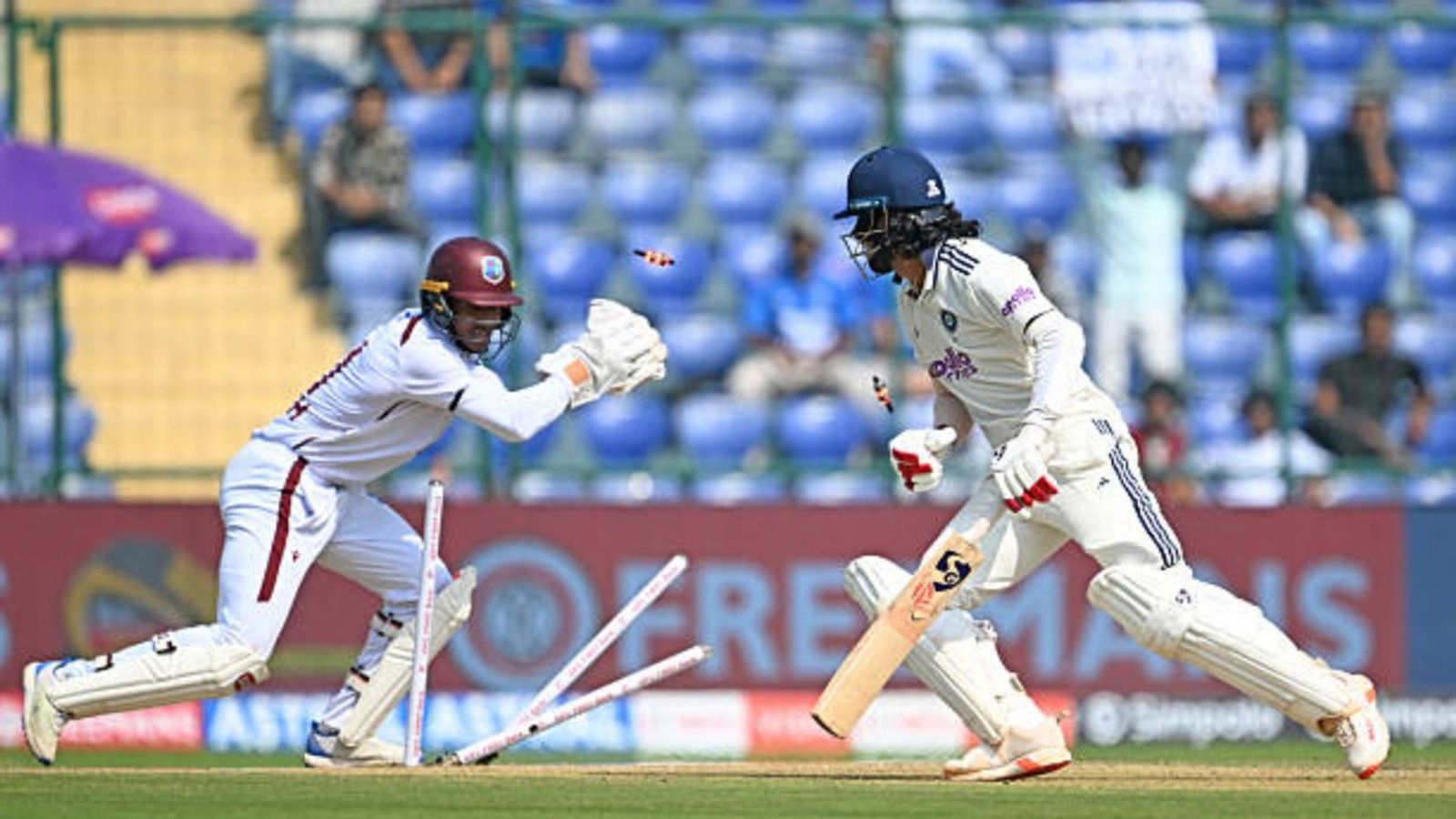 'He will curse himself for his dismissal...': Ex-India star feels KL Rahul could have done better with the bat vs West Indies in 2nd Test West Indies' wicketkeeper Tevin Imlach (L) stumps India's KL Rahul (R) during the first day of the second and last Test cricket match between India and West Indies at the Arun Jaitley Stadium