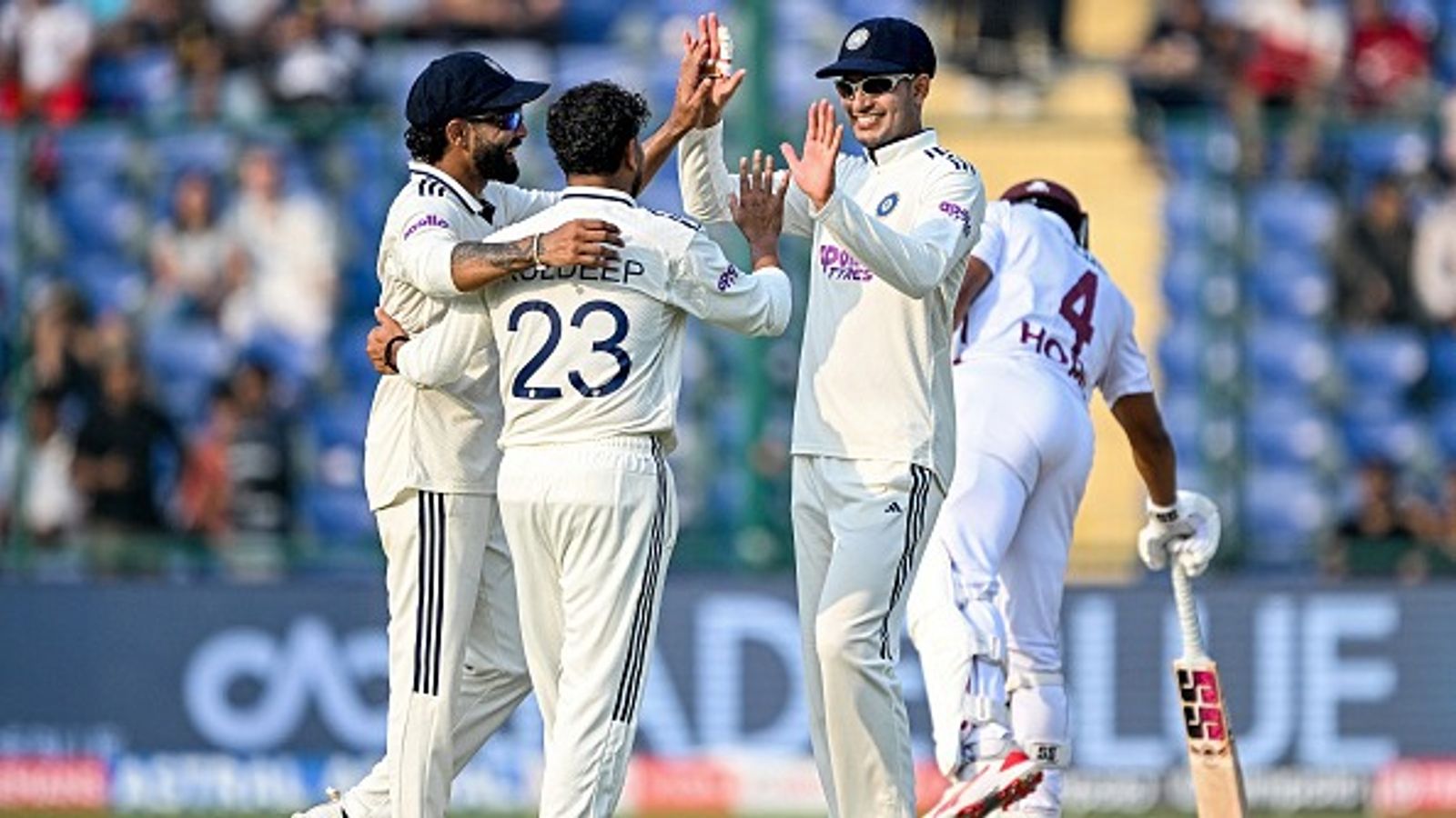 IND vs WI, 2nd Test: Jadeja's 3-fer leaves West Indies reeling at 140/4 after Gill's superlative ton help hosts post 518/5 dec on Day 2 India's Kuldeep Yadav (2L) celebrates with Ravindra Jadeja (L) and captain Shubman Gill (2R) in this frame