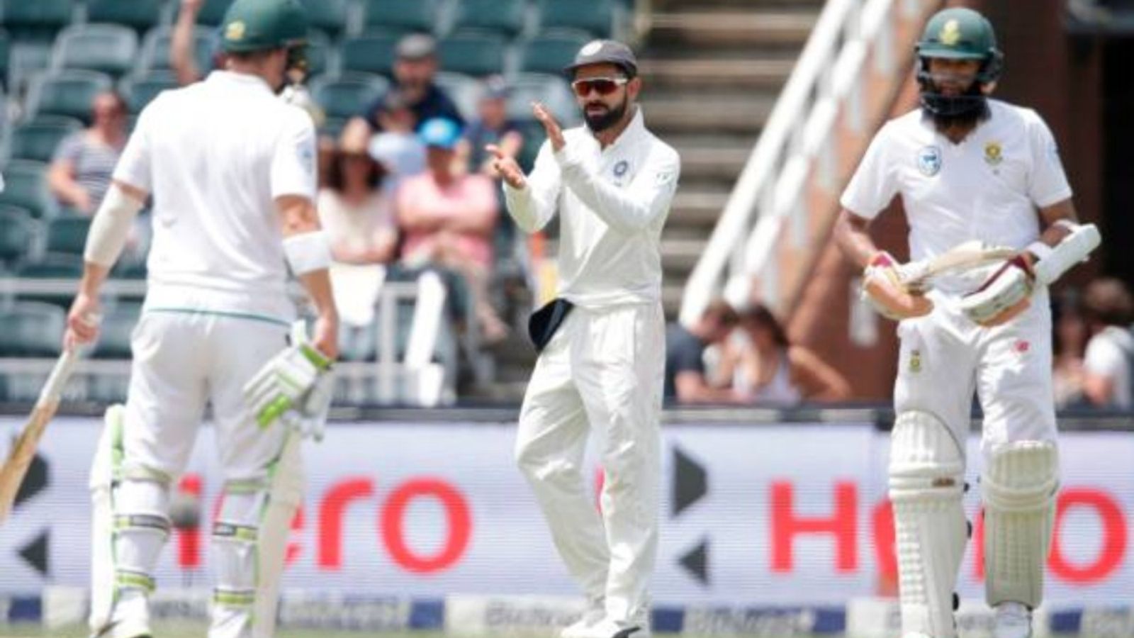 Hashim Amla picks all-time Test XI featuring players from 4 countries, no place for Virat Kohli as ex-Australia captain makes the cut India's captain Virat Kohli (C) reacts as South African batters Dean Elgar (L) and Hashim Amla (R) take runs during the fourth day of the third Test at Wanderers cricket ground on January 27, 2018 in Johannesburg.
