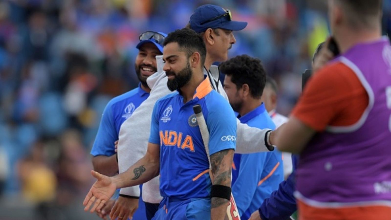 'Rohit Sharma, Virat Kohli... they know that these youngsters are pushing them': Ravi Shastri's blunt verdict on senior duo's ODI World Cup 2027 chances (L-R) India's Rohit Sharma, Virat Kohli and head coach Ravi Shastri on the pitch after their victory in the 2019 Cricket World Cup group stage match against Sri Lanka at Headingley in Leeds, northern England, on July 6, 2019.
