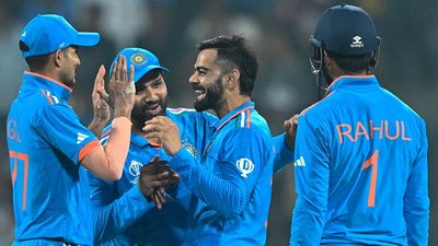 'Kind of characters Virat Kohli and Rohit Sharma are...': Shubman Gill's IPL coach feels senior batting duo will be flexible under new captain Virat Kohli (2R) celebrates with Shubman Gill (L), captain Rohit Sharma (2L) and KL Rahul after taking the wicket of Netherlands' captain Scott Edwards during the 2023 ICC Men's Cricket World Cup