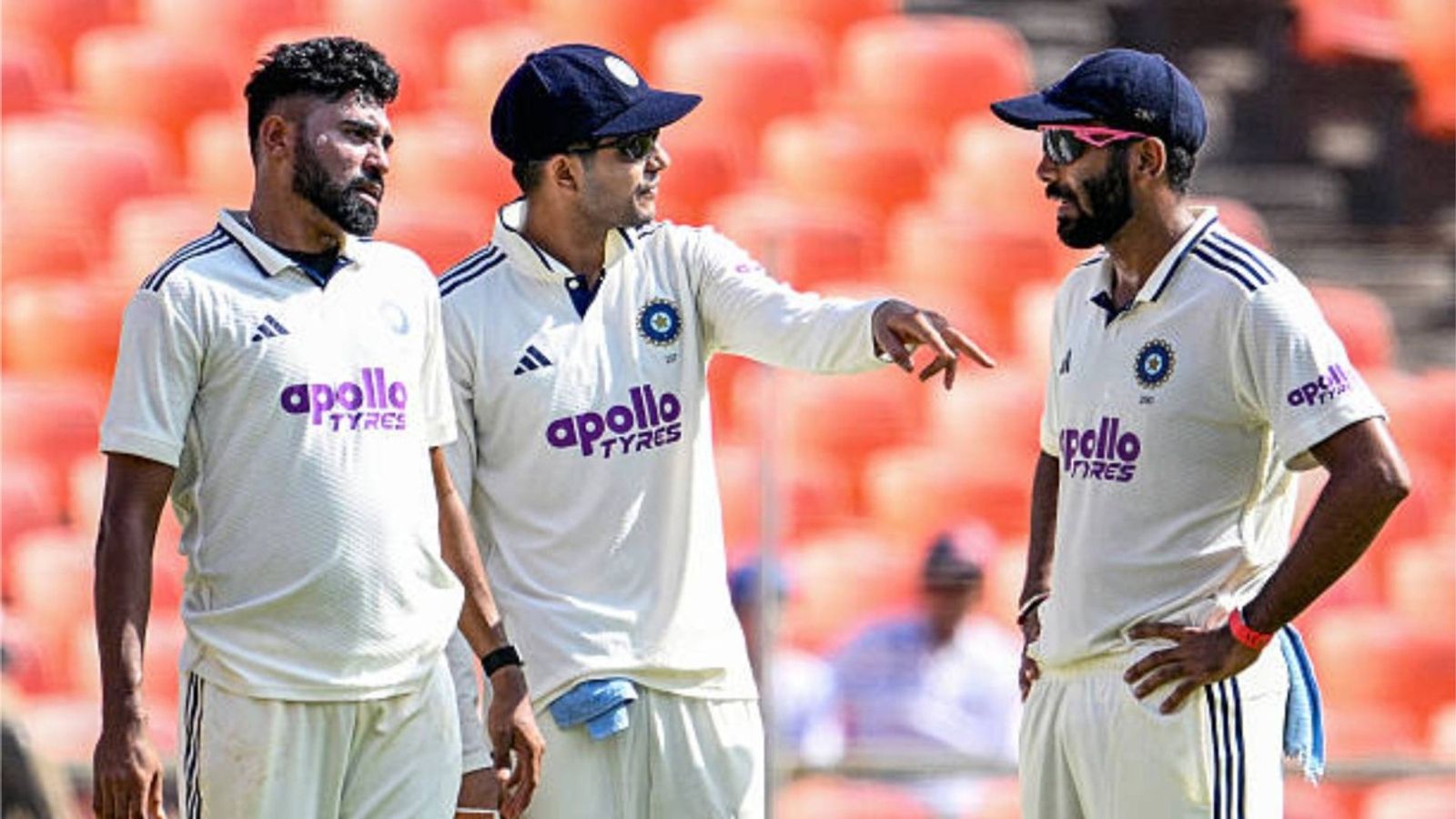 'We were around 300 runs ahead...': Shubman Gill reveals why India enforced follow-on over West Indies in 2nd Test India's Mohammed Siraj (L), captain Shubman Gill (C) and Jasprit Bumrah speak during the third day of the first Test cricket match between India and West Indies at the Narendra Modi Stadium