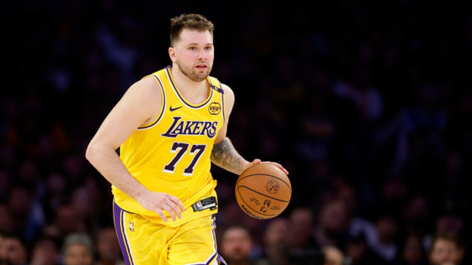 Will Luka Doncic play in Lakers vs Suns pre-season game? Insider reveals Luka Doncic in the frame (Images via Getty)