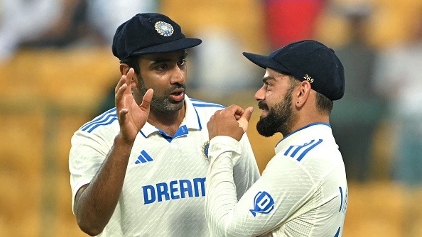 Virat said years ago they must be fixed...': Ravichandran Ashwin explain Kohli's calls for permanent Test centres in India after 2-0 series win over West Indies India's Ravichandran Ashwin speaks with his teammate Virat Kohli (R) in a Test match