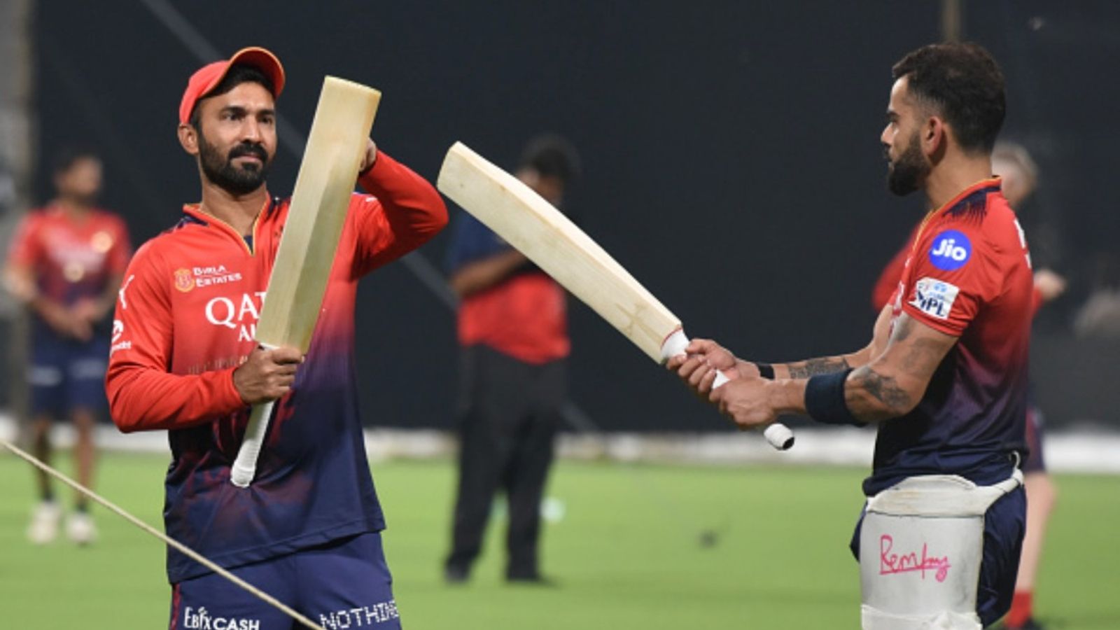 'The man is serious about wanting to play World Cup': RCB mentor Dinesh Karthik reveals how much Virat Kohli practised in London during 'big layoff' Royal Challengers Bengaluru's Virat Kohli and batting coach Dinesh Karthik during a training session at the Eden Gardens in Kolkata, India, on March 20, 2025.