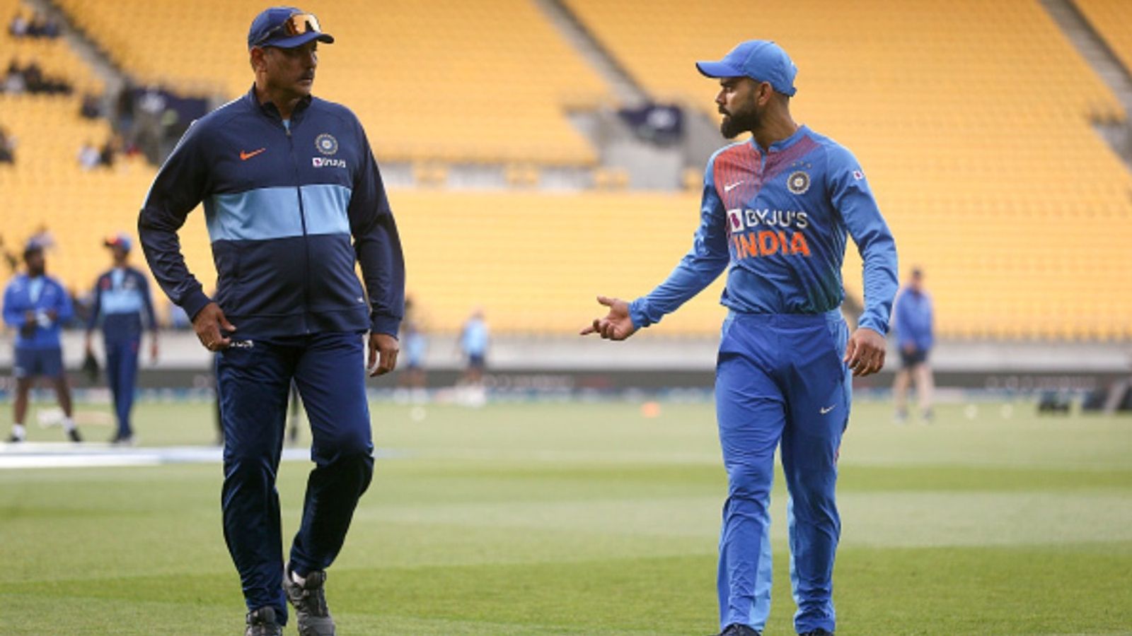 'Get to that bloody gym and start training': Ravi Shastri recalls Virat Kohli's message to 'lazy' players during his tenure as captain Virat Kohli of India talks to coach Ravi Shastri during game four of the T20I series against New Zealand at Sky Stadium on January 31, 2020 in Wellington, New Zealand.