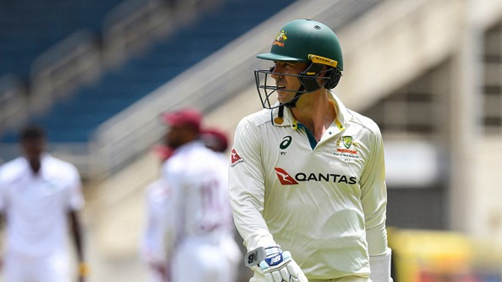 Australia set to appoint stand-in captain for Ashes if Pat Cummins misses out due to injury, confirms Chief Selector George Bailey Pat Cummins of Australia walks off the field dismissed by unseen Alzarri Joseph of West Indies during the third day of the third Test cricket match between West Indies and Australia at Sabina Park in Kingston, Jamaica, on July 14, 2025.