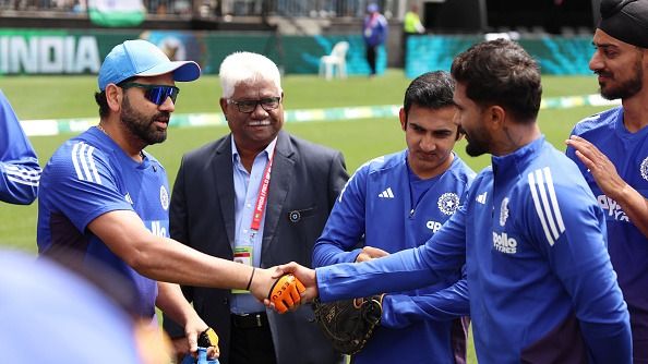Rohit Sharma of India presents Nitish Kumar Reddy's of India maiden cap during game one of the One Day International series between Australia and India at Perth Stadium on October 19, 2025 in Perth, Australia