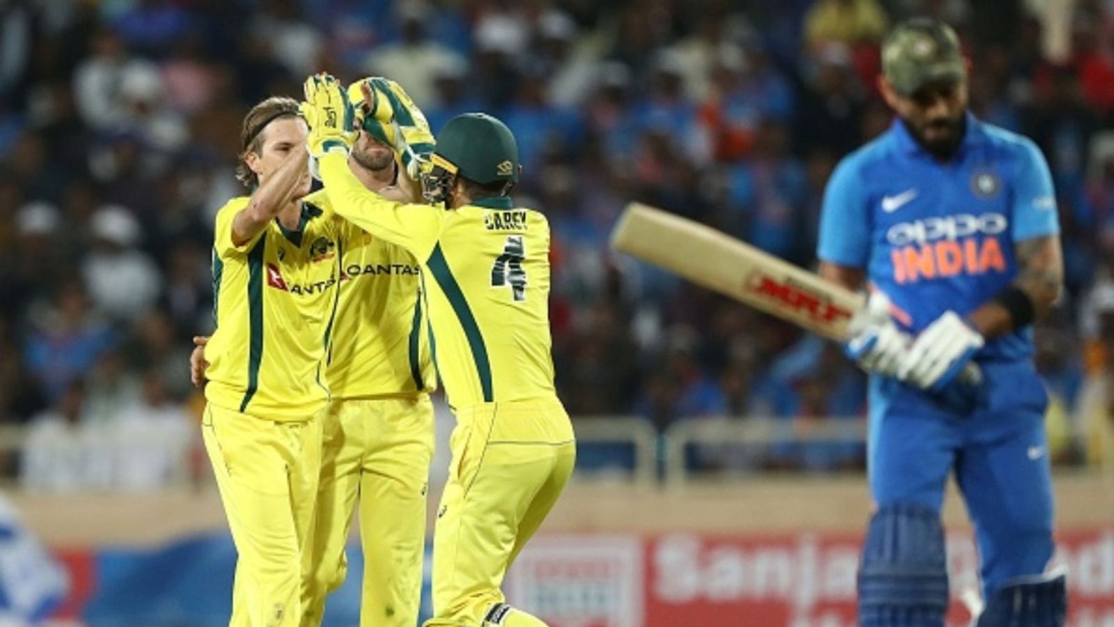 Australia's left-arm pacer and wicketkeeper ruled out of 2nd ODI vs India, Virat Kohli's nemesis returns after missing opener Adam Zampa of Australia celebrates taking the wicket of Virat Kohli of India during game three of ODI series at JSCA International Stadium Complex on March 08, 2019 in Ranchi, India.