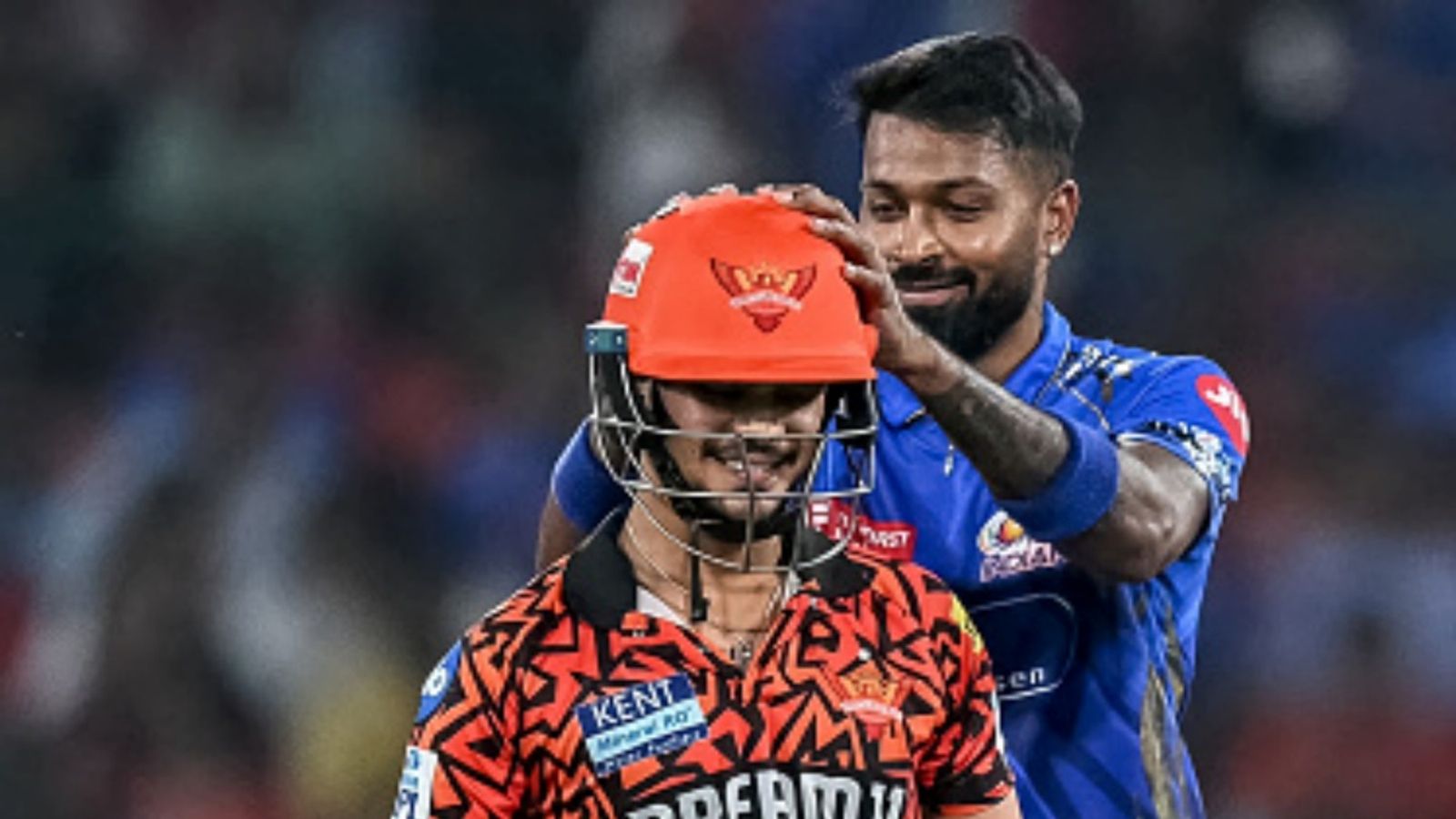 Rs 11.25 crore worth Ishan Kishan on 3 franchises' radar ahead of IPL mini-auction, offering SRH an all-cash/trade deal: Report Mumbai Indians' captain Hardik Pandya (R) gestures as Sunrisers Hyderabad's Ishan Kishan walks back to the pavilion after his dismissal during the Indian Premier League (IPL) match at the Rajiv Gandhi International Stadium in Hyderabad on April 23, 2025.