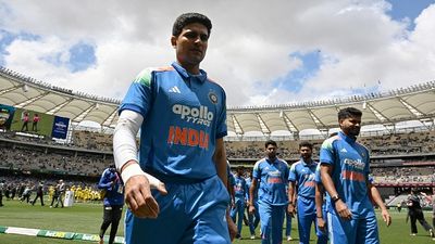 'We had just enough runs but...': Shubman Gill blames 3 stars for India's series-losing defeat against Australia in 2nd ODI India's captain Shubman Gill (L) escorts his team off the field in this frame