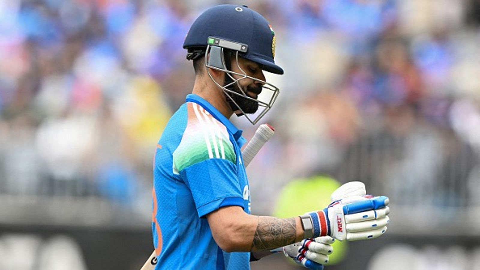 'There are two zeroes, all he has to do is add the one on the side...': Former India coach's big prediction on Virat Kohli's performance for 3rd ODI goes viral India's Virat Kohli walks off the field after his dismissal during the first one-day international cricket match between Australia and India in Perth on October 19, 2025.