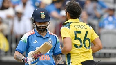 Michael Clarke's bold prediction on Virat Kohli ahead of 3rd ODI against Australia, says 'he’s got two ducks...' India's Virat Kohli (L) reacts as Australia's paceman Mitchell Starc celebrates his wicket in this frame