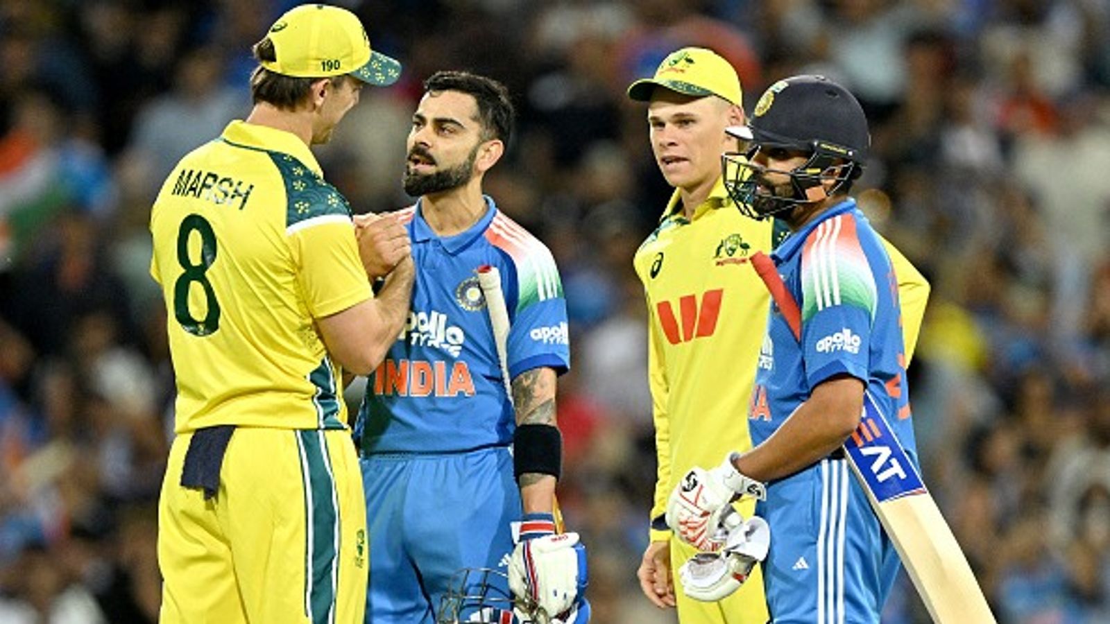 'We have seen Rohit Sharma, Virat Kohli do that over 10 years': Mitchell Marsh surrenders to RO-KO after India's robust chase at SCG India's Virat Kohli (2L) shakes hands with Australia captain Mitchell Marsh (L) as Rohit Sharma (R) and Cooper Connolly look on in this frame