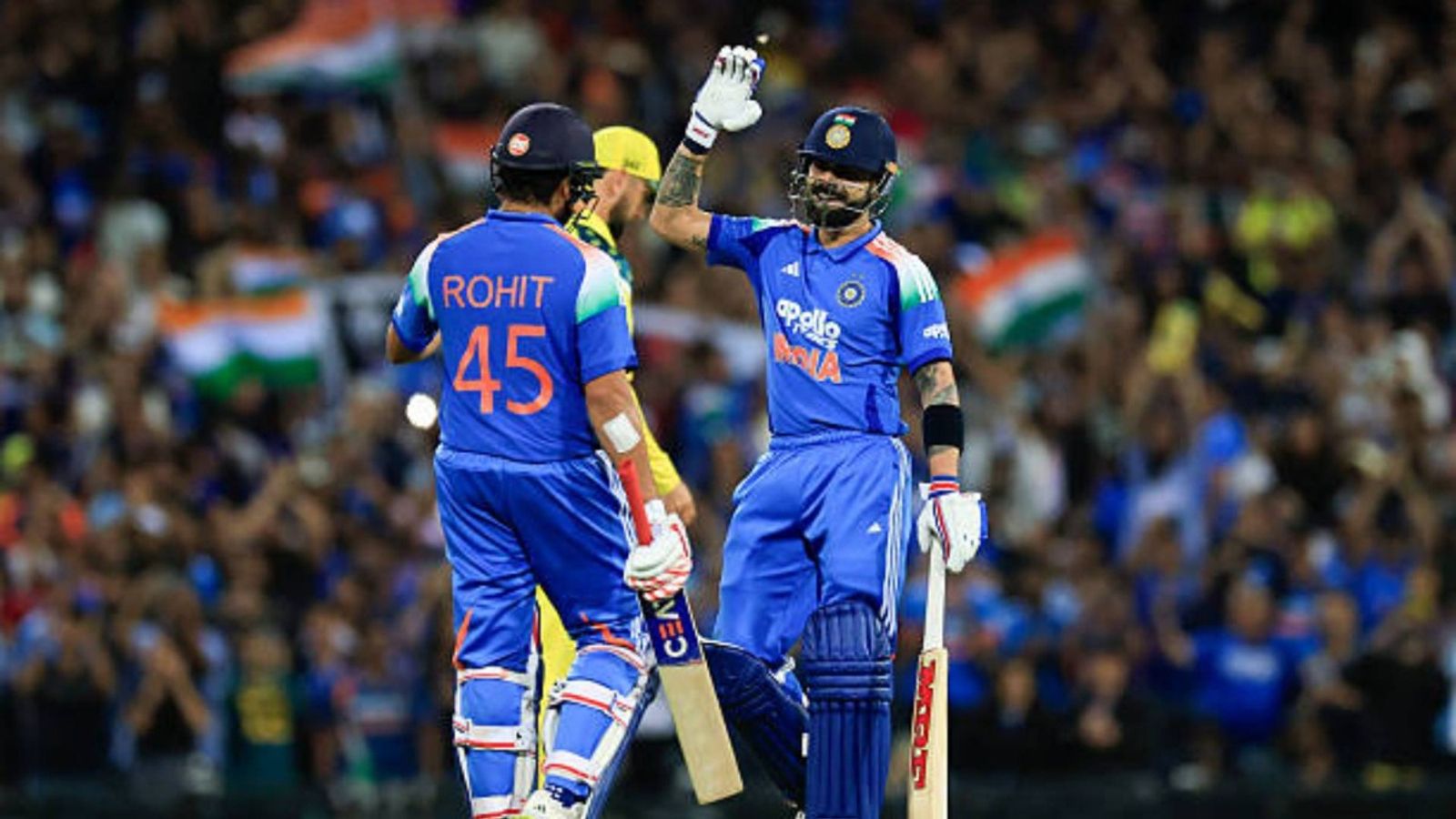 'We enjoyed every moment...': Rohit Sharma reflects on massive partnership with Virat Kohli in 3rd ODI vs Australia Rohit Sharma of India (L) celebrates with Virat Kohli of India after reaching his century during game three of the One Day International series between Australia and India at Sydney Cricket Ground
