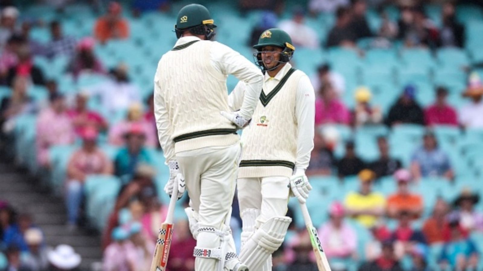 'I am a little biased because...': Usman Khawaja backs his 'friend' to replace underfire Sam Konstas as opening partner for Ashes Australia's Usman Khawaja (R) talks with Matt Renshaw during day two of the third Test against South Africa at the Sydney Cricket Ground (SCG) in Sydney on January 5, 2023.