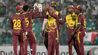 BAN vs WI: Quartet of Akeal, Shepherd, Athanaze, Hope hand West Indies tight 14-run win over Bangladesh in 2nd T20I to seal series 2-0 West Indies' Akeal Hosein (C) celebrates with his teammates in this frame