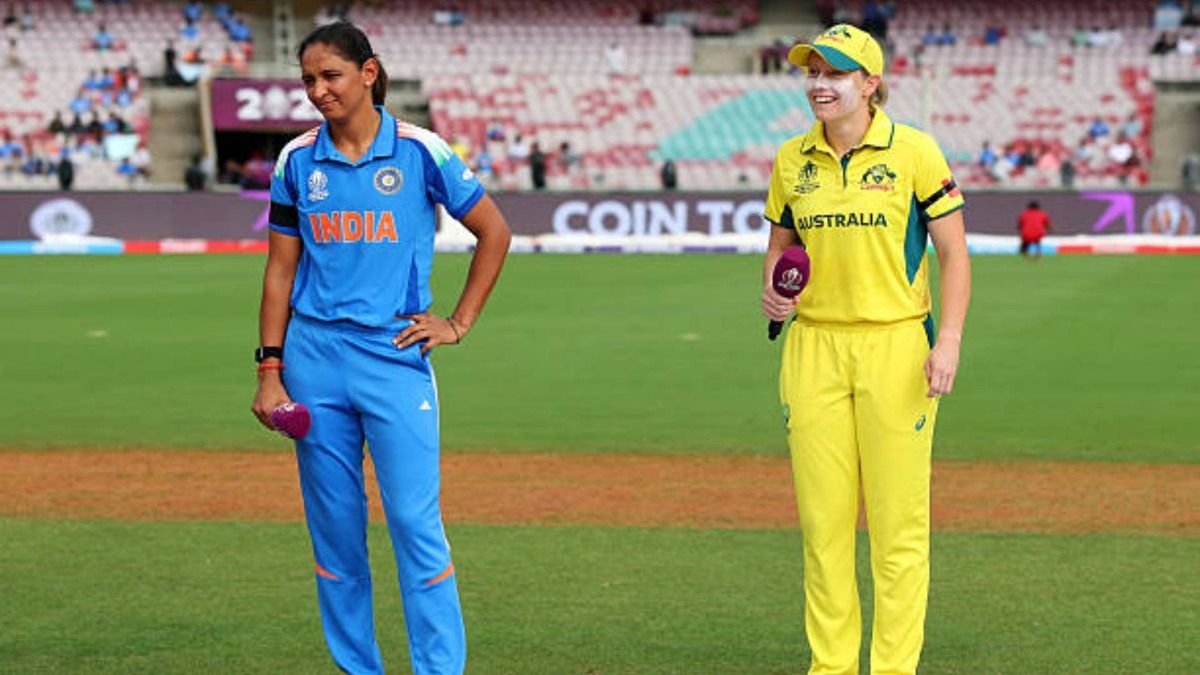 Harmanpreet Kaur of India and Alyssa Healy of Australia look on ahead of the coin toss prior to the ICC Women's Cricket World Cup India 2025 Semi-Final match between India and Australia