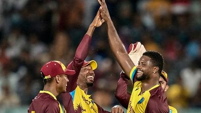 RCB star roars with stunning hat-trick against Bangladesh, becomes only second WI player to bag this mighty T20I feat West Indies' Romario Shepherd (R) celebrates with his teammates in this frame