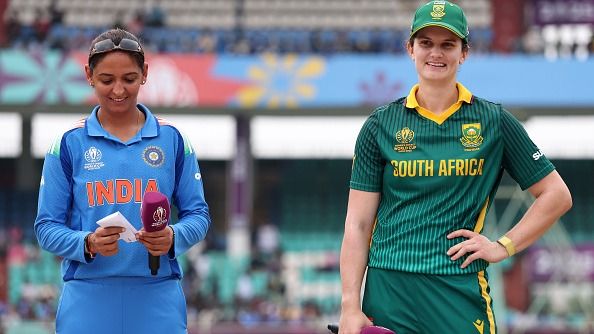 India captain Harmanpreet Kaur (L) and South Africa skipper Laura Wolvaardt in this frame