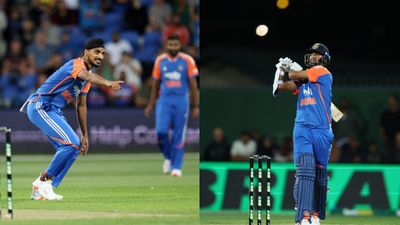 IND vs AUS: India roar back in style as Arshdeep's 3-fer, Washington's 49 thrash Australia by 5 wickets in 3rd T20I to level series 1-1 India's Arshdeep Singh (L) and Washington Sundar in this frame