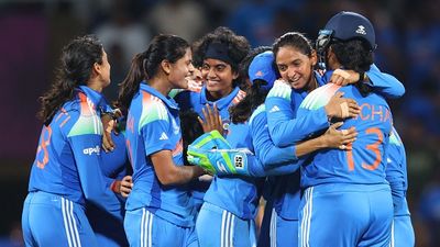 'Middle finger of her left hand had a hairline fracture...': India’s unsung hero braved pain to script a record-breaking moment in Women’s ODI World Cup 2025 icha Ghosh of India is congratulated by team mate Harmanpreet Kaur after taking the catch to dismiss Marizanne Kapp of South Africa