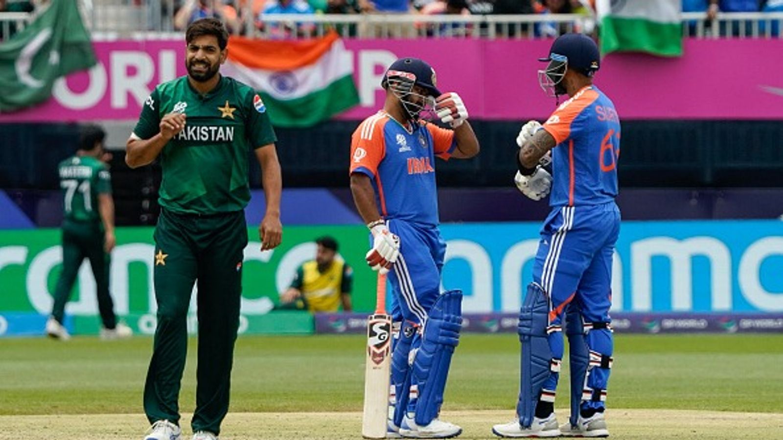 ICC sanctions Haris Rauf, Suryakumar Yadav, Jasprit Bumrah after India vs Pakistan Asia Cup 2025 for breaching Code of Conduct Pakistan's Haris Rauf looks on as India's Rishabh Pant talks with teammate Suryakumar Yadav after Pant hit four during the ICC men's Twenty20 World Cup 2024