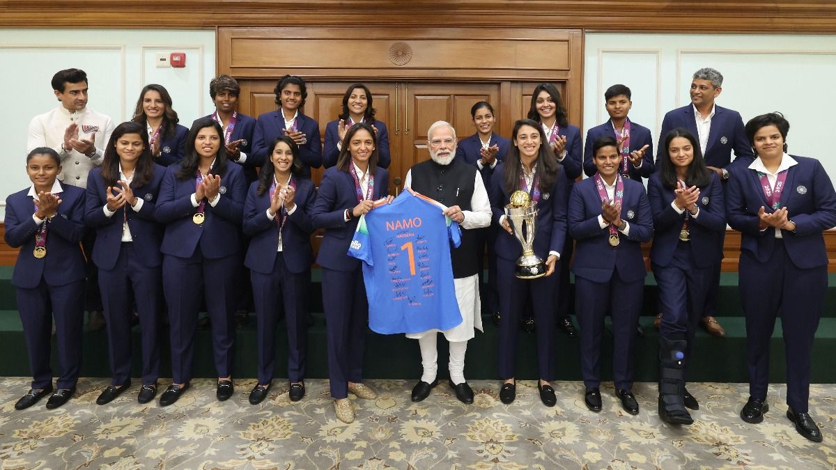 World Cup 2025-winning India women's team gifts special signed 'Namo' jersey to PM Narendra Modi in unforgettable meeting SportsTak