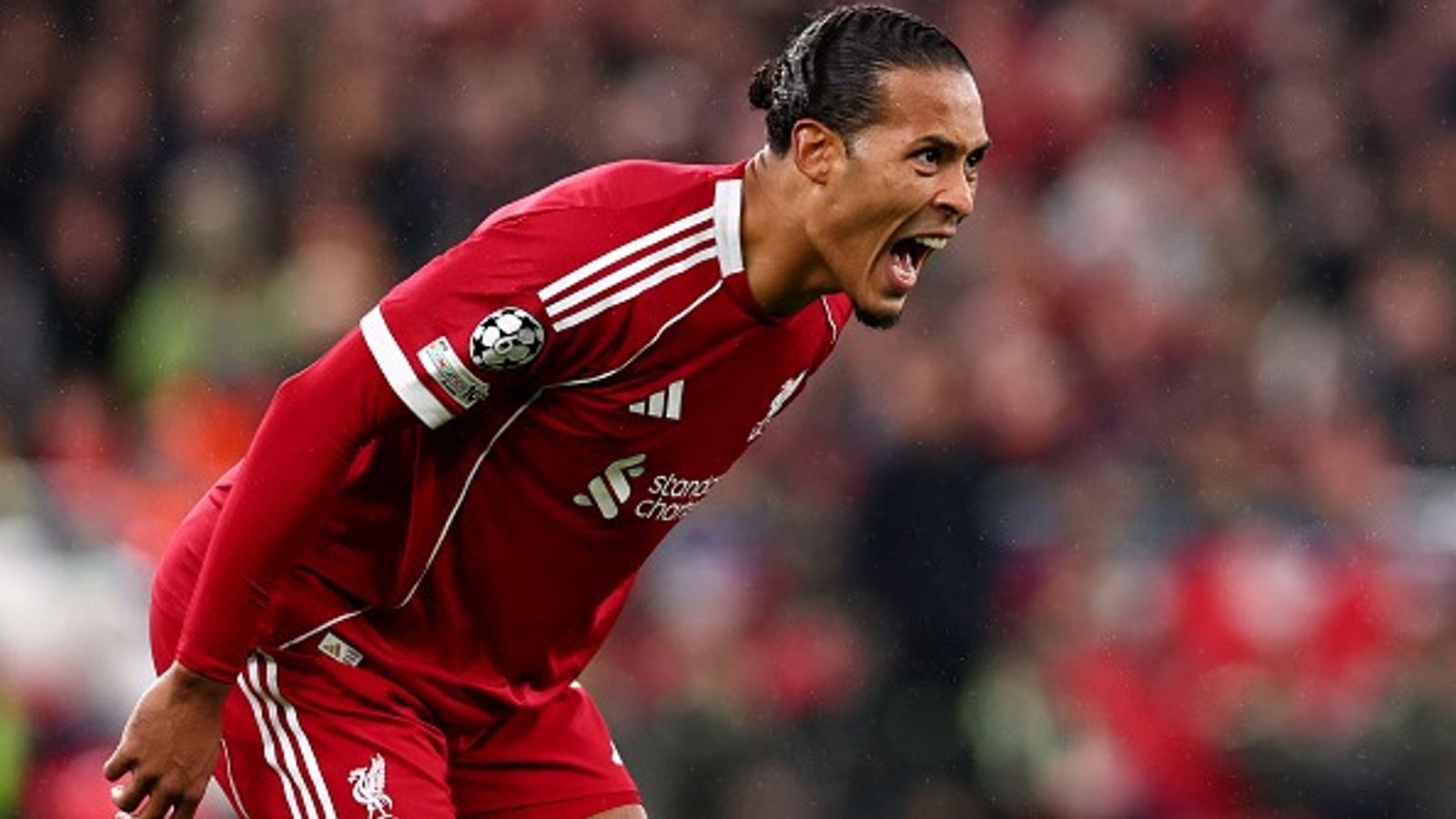 Liverpool skipper Virgil van Dijk responds to Wayne Rooney's criticism during live TV exchange Virgil van Dijk in the frame.