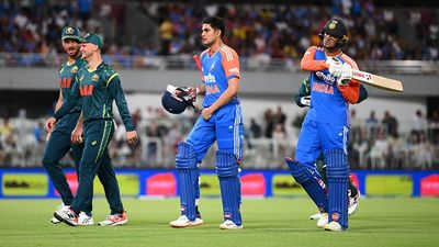 IND vs AUS: India seal series 2-1 as 5th T20I against Australia called off due to relentless rain at Gabba India's Shubman Gill (c) and Abhishek Sharma (R) leave the field along due to a severe weather warning during 5th T20I against Australia