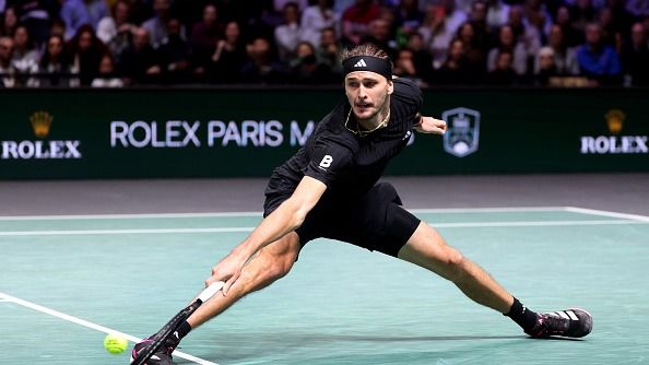 Alexander Zverev of Germany plays a backhand against Daniil Medvedev of Russia during their Men's Singles Quarter Final match on day five of the Rolex Paris Masters 2025 on October 31, 2025 in Nanterre, France.
