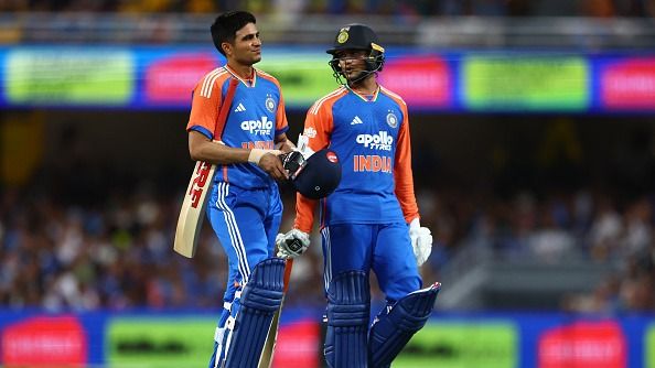 Shubman Gill and Abhishek Sharma of India leave the field due to a severe weather warning during game five of the T20 International series between Australia and India at The Gabba
