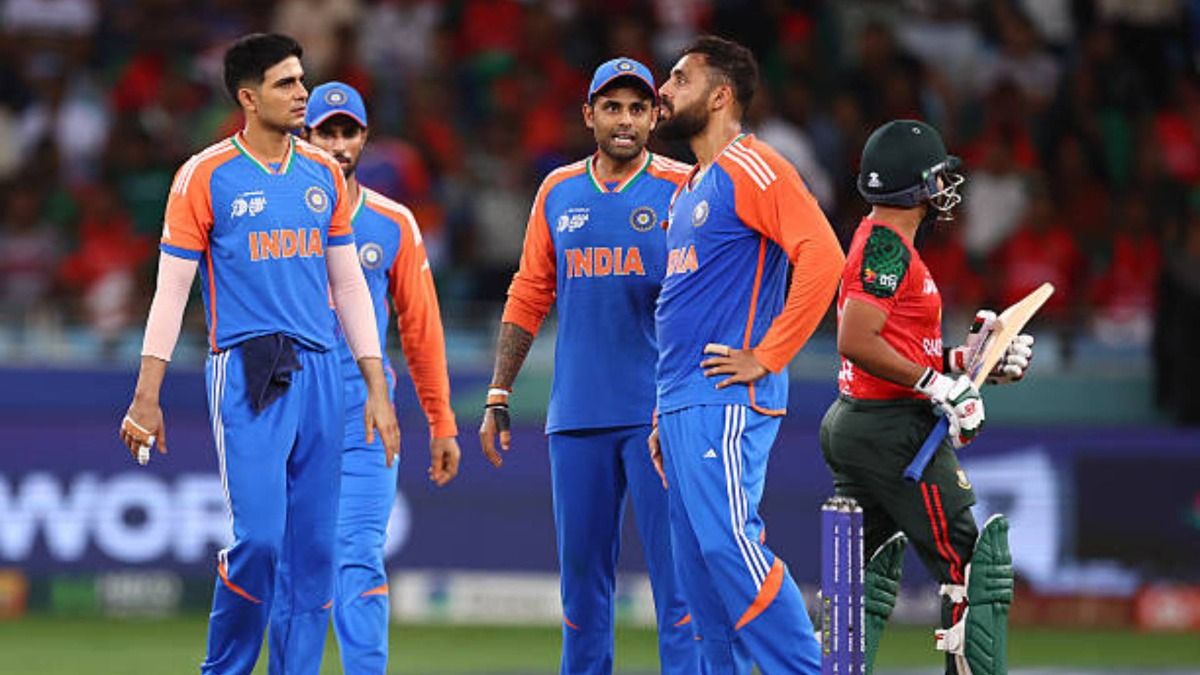 Varun Chakravarthy of India celebrates with team mates after dismissing Shamim Hossain of Bangladesh during the Asia Cup match between India and Bangladesh Varun Chakravarthy of India celebrates with team mates after dismissing Shamim Hossain of Bangladesh during the Asia Cup match between India and Bangladesh