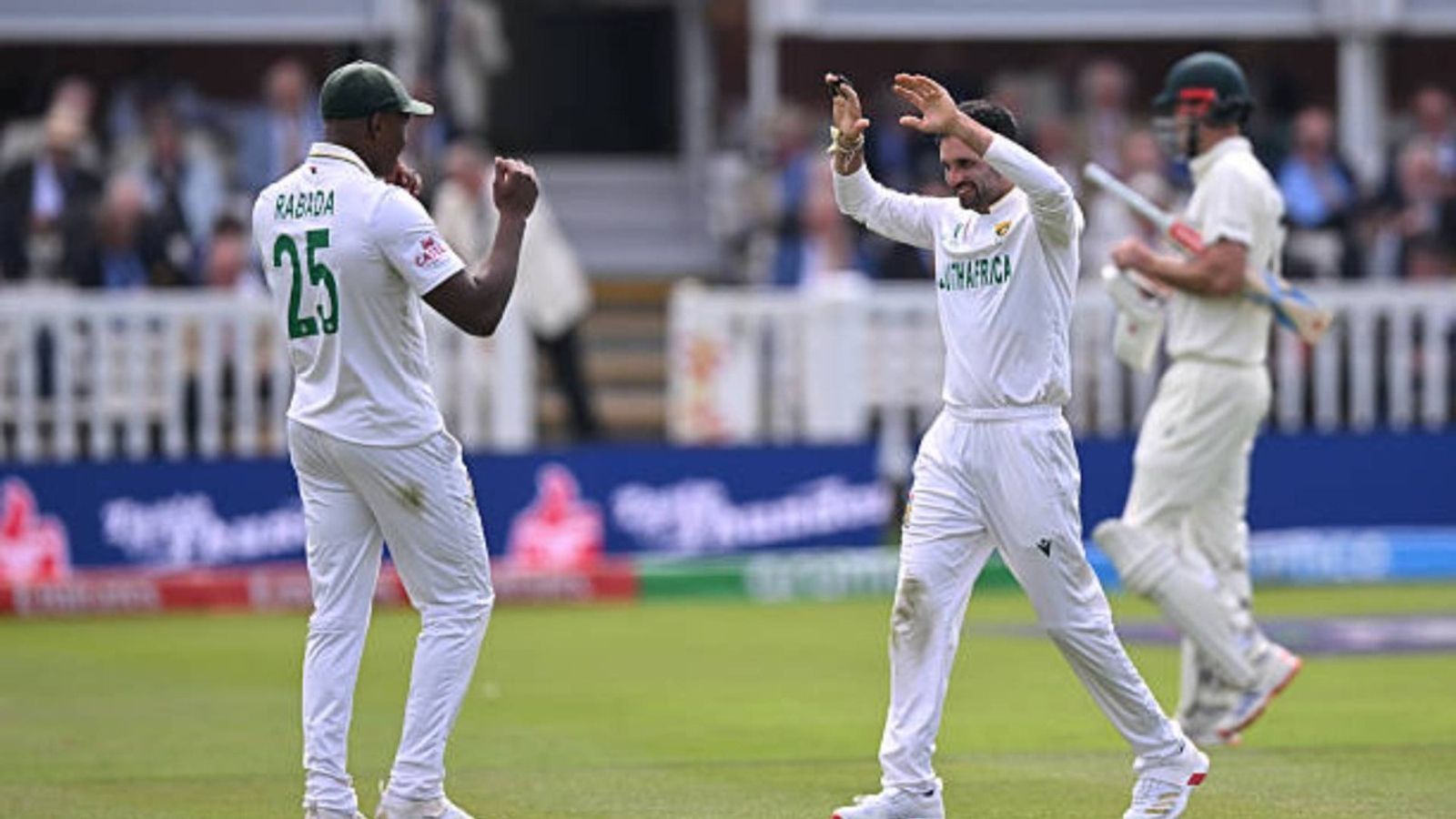 'There is a real hunger within the camp to beat them...': South Africa bowler fires major warning to Team India ahead of Test series Keshav Maharaj of South Africa celebrates taking the wicket of Alex Carey of Australia with teammate Kagiso Rabada during Day One of the ICC World Test Championship Final 2025