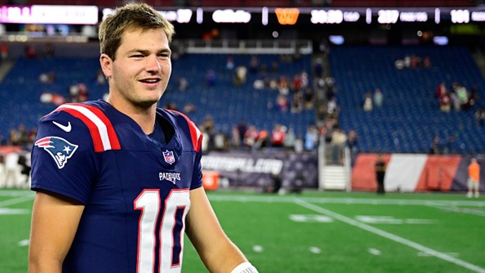 Patriots QB Drake Maye proudly shows off special Celtics' Golden City edition jersey gift Drake Maye in the frame.