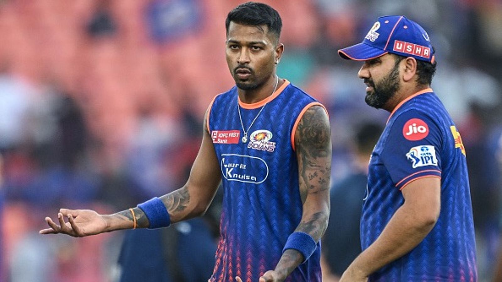 Big News: After Shardul Thakur, West Indies star traded to MI from GT for Rs 2.6 cr ahead of IPL 2026 Mumbai Indians' captain Hardik Pandya (L) speaks with his teammate Rohit Sharma in this frame